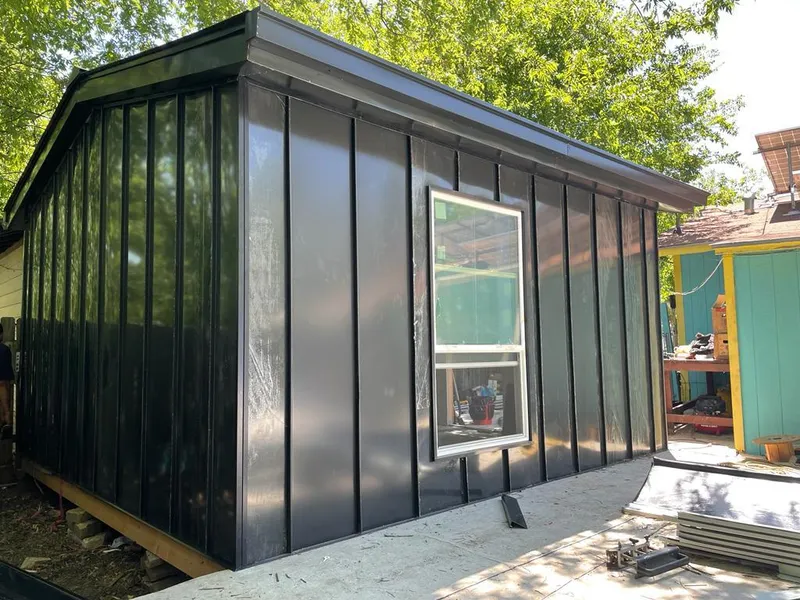 Black standing seam metal wall panels for Metal Roof Installation in Waukesha