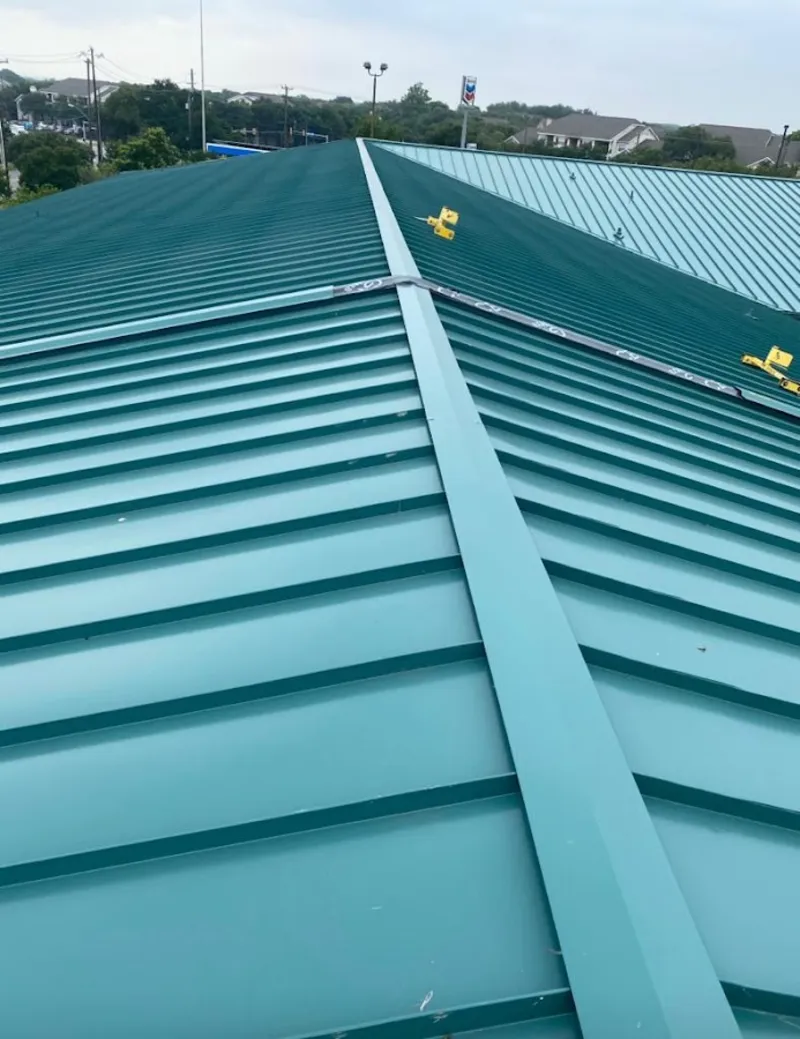 Green commercial metal roof ridge and valley for Metal Roof Repair in Waukesha